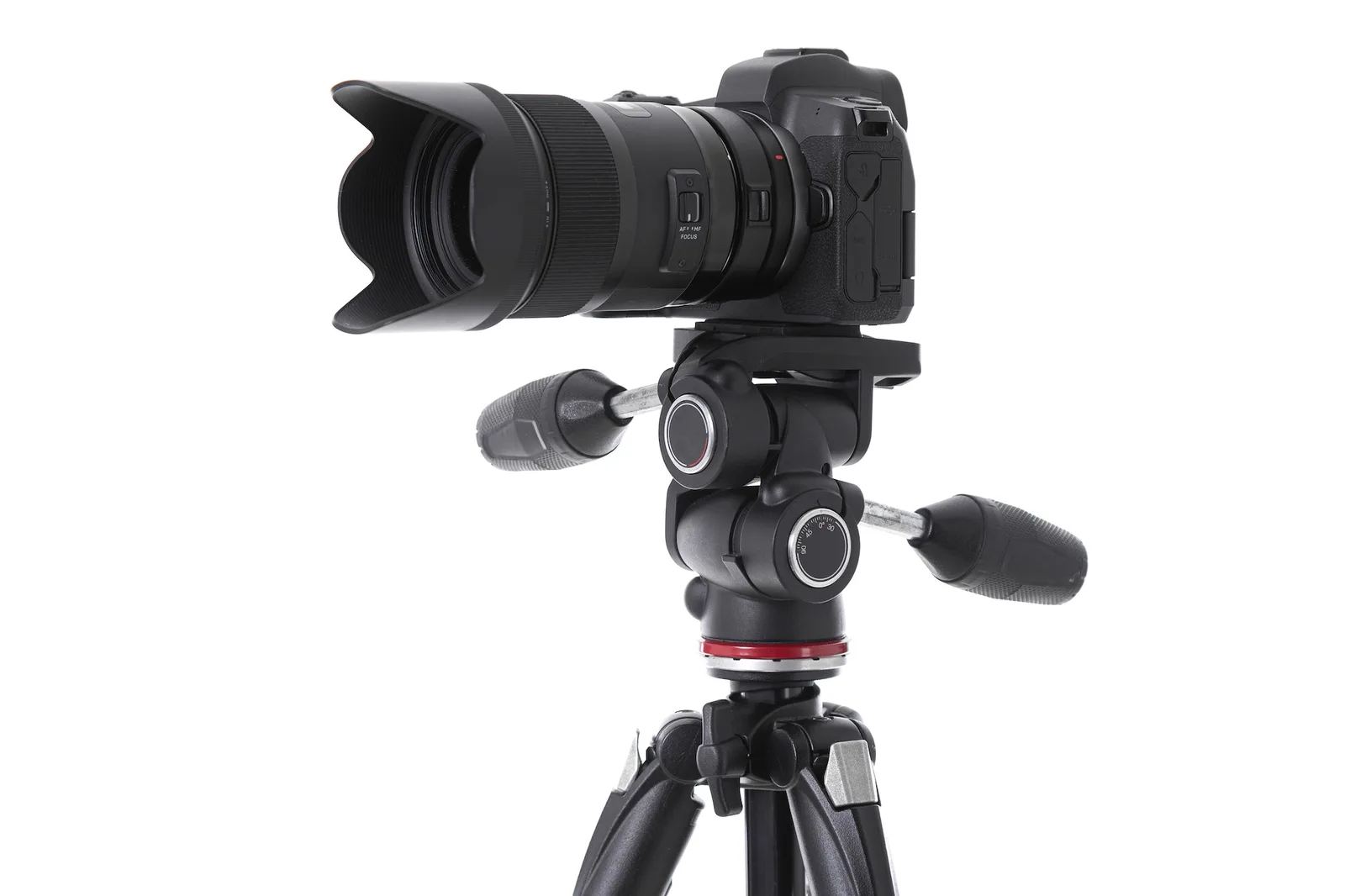 Side-view of professional camera device on tripod isolated
